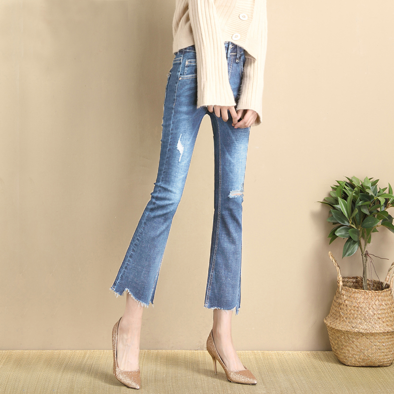 Broken hole micro flared nine point jeans women 2020 spring and autumn new versatile jeans women's elastic raw edge flared pants women